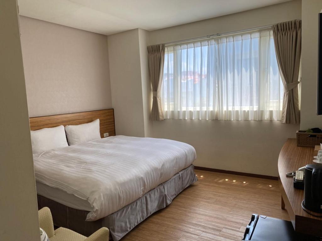 Postel nebo postele na pokoji v ubytování LoveSea 126 Beach Inn