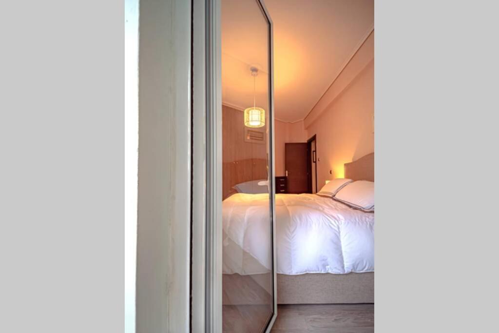 Posteľ alebo postele v izbe v ubytovaní A 2 bedroom luxurious experience in Pagrati