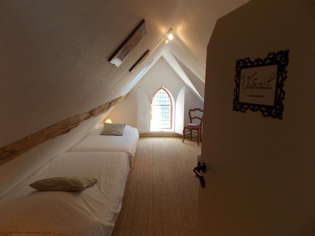 Postel nebo postele na pokoji v ubytování Domaine du Gué du Roi