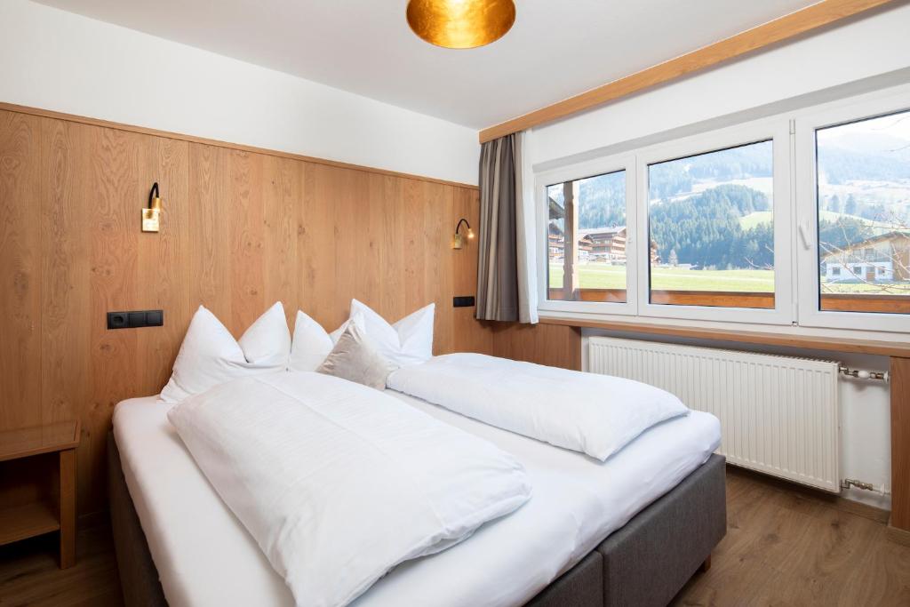 Postel nebo postele na pokoji v ubytování Hotel Andreas