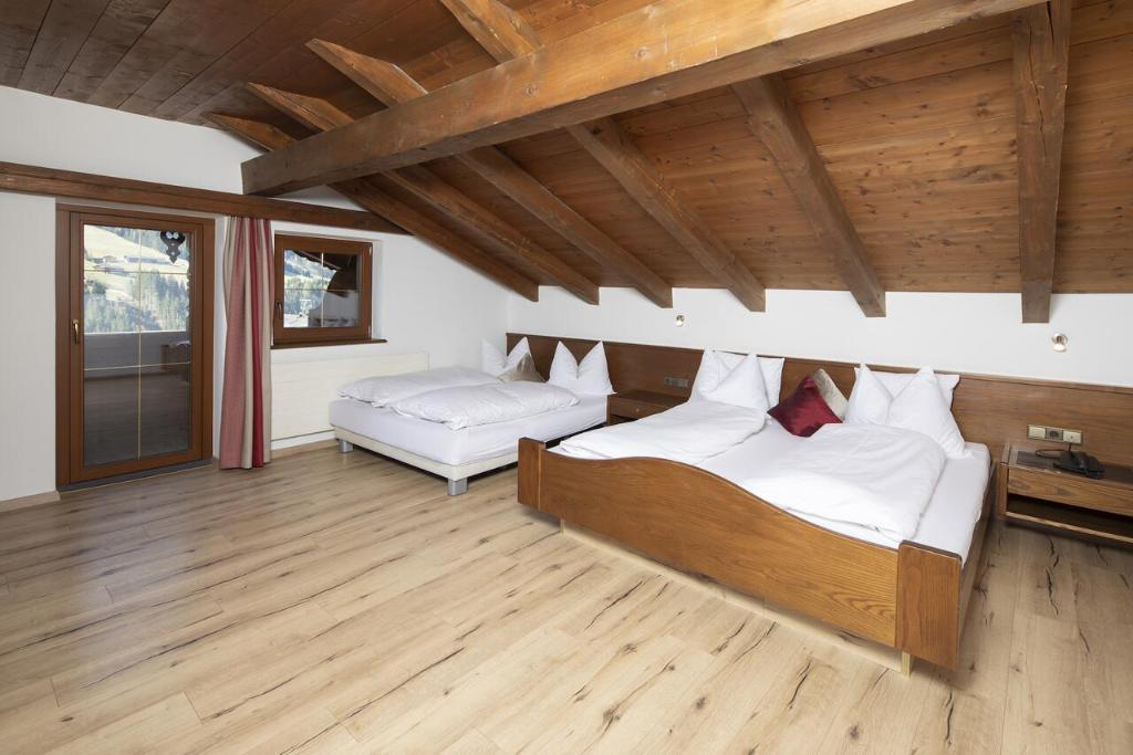 Postel nebo postele na pokoji v ubytování Hotel Andreas