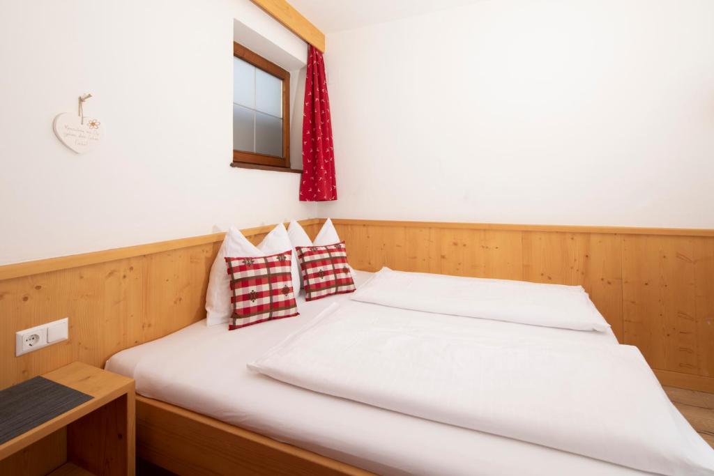 Postel nebo postele na pokoji v ubytování Hotel Andreas