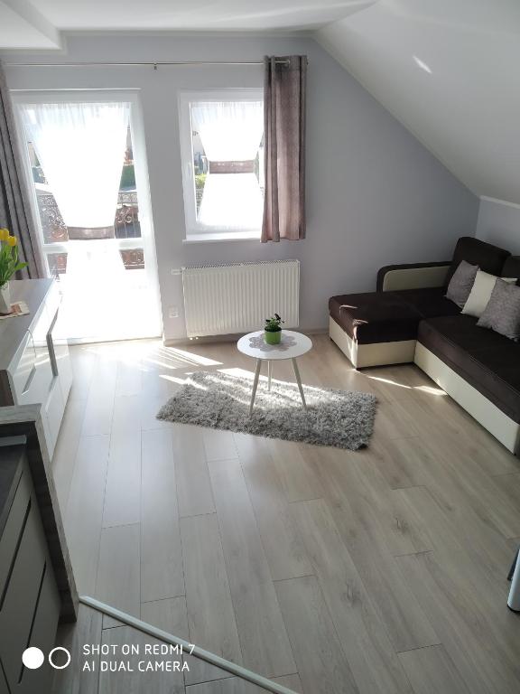 Posezení v ubytování Apartamenty u" Lusi"
