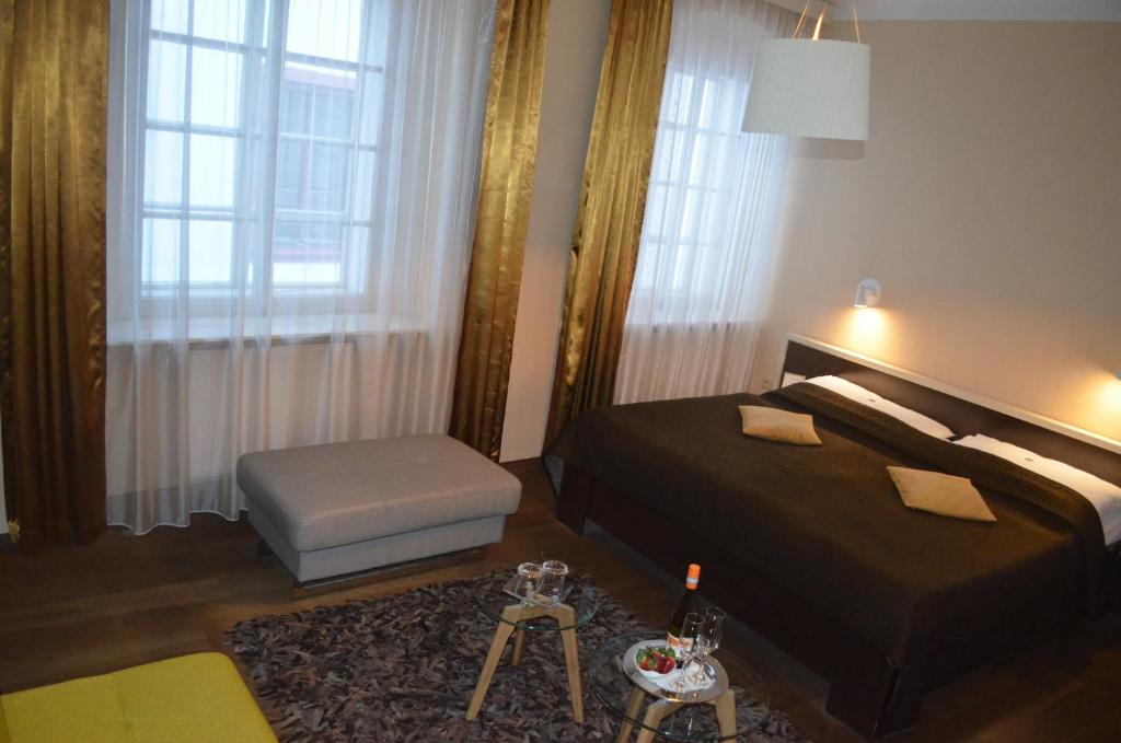 Postel nebo postele na pokoji v ubytování Hotel Peregrin