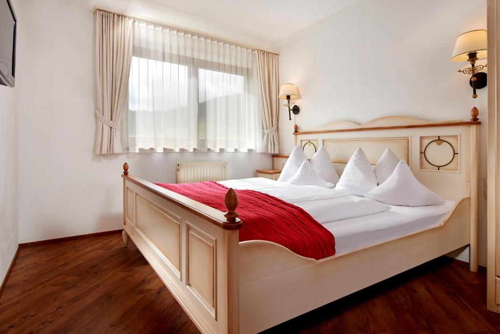Posteľ alebo postele v izbe v ubytovaní Aparthotel Dachsteinblick