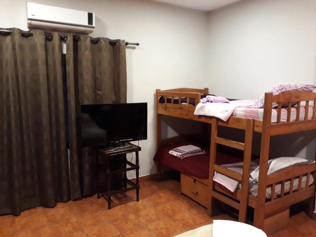 Postel nebo postele na pokoji v ubytování Residencia Leones de Castilla