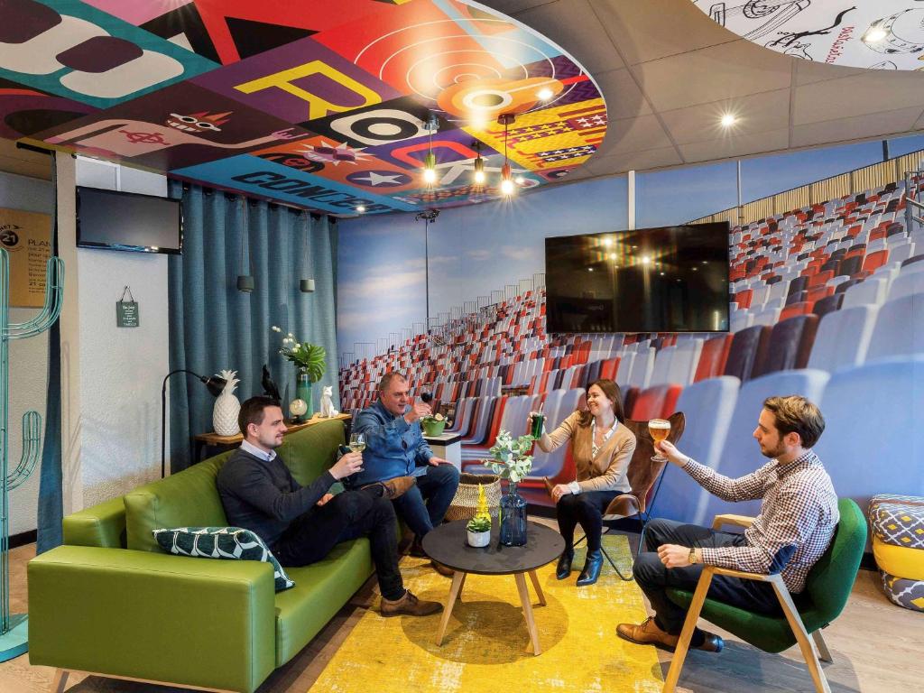 a group of people sitting in a room at ibis Lille Villeneuve-d'Ascq Grand Stade in Villeneuve d'Ascq