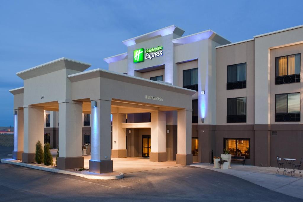 a hotel with a sign on the front of it at Holiday Inn Express Rawlins, an IHG Hotel in Rawlins