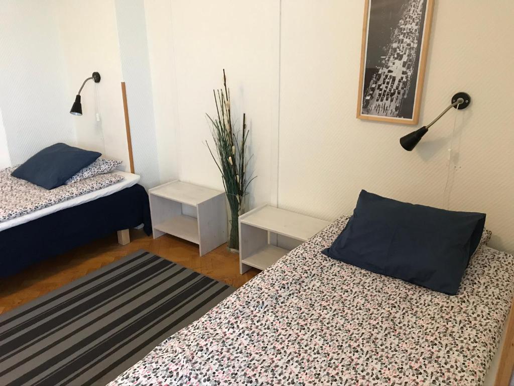 Postel nebo postele na pokoji v ubytování Gävle Bed & Breakfast