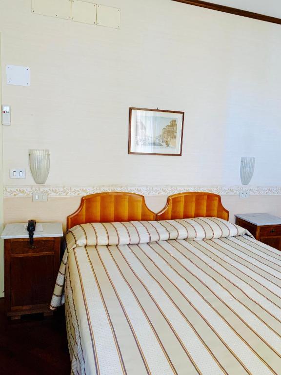 Postel nebo postele na pokoji v ubytování Hotel La Calcina