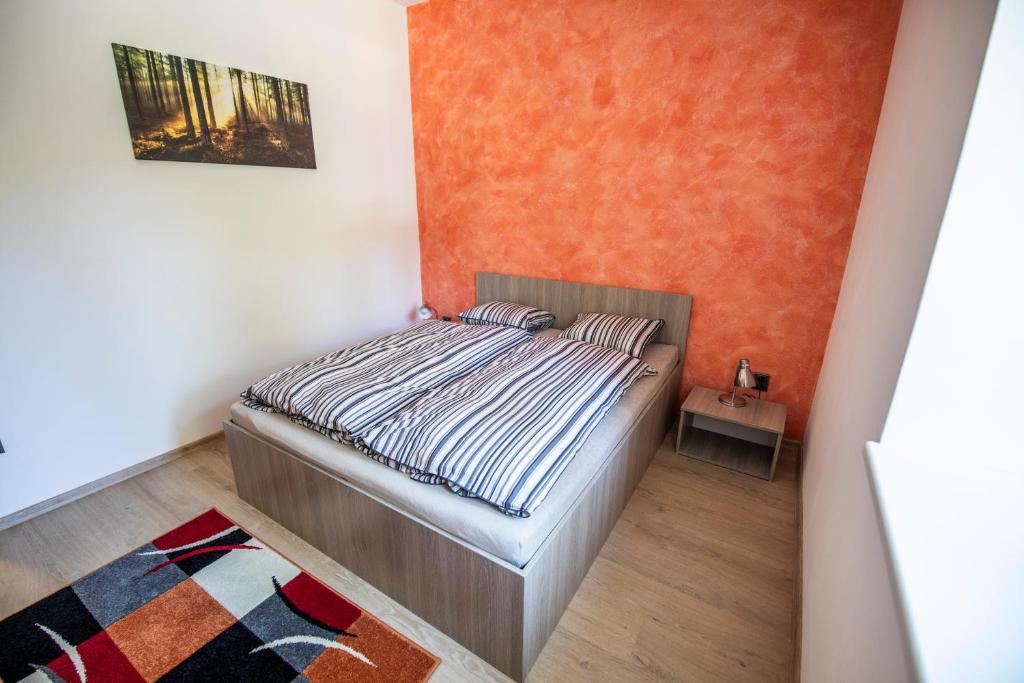Postel nebo postele na pokoji v ubytování Apartmány pod Jeřábem, Šanov 67, Červená Voda