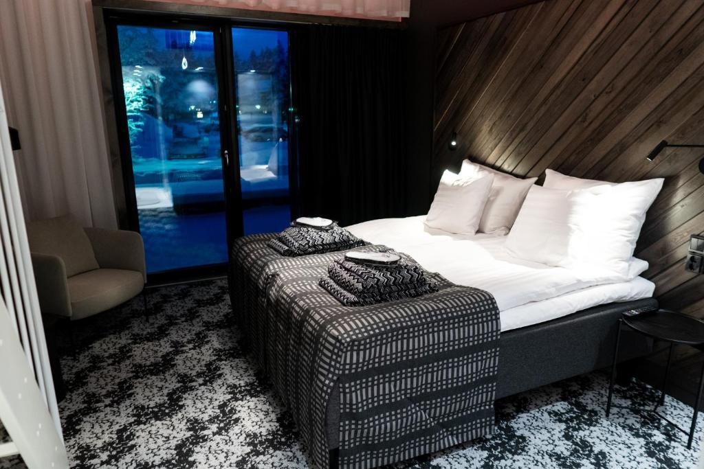 Postel nebo postele na pokoji v ubytování Design Hotel Levi