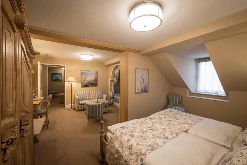 Postel nebo postele na pokoji v ubytování Hotel Der Kleine Prinz