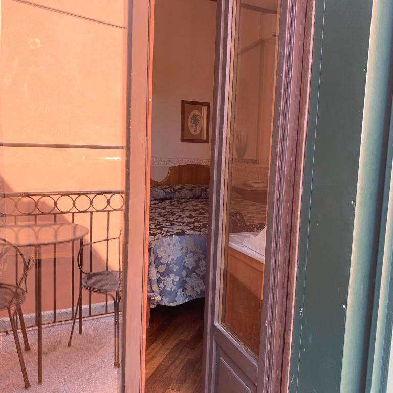 Postel nebo postele na pokoji v ubytování Hotel La Calcina