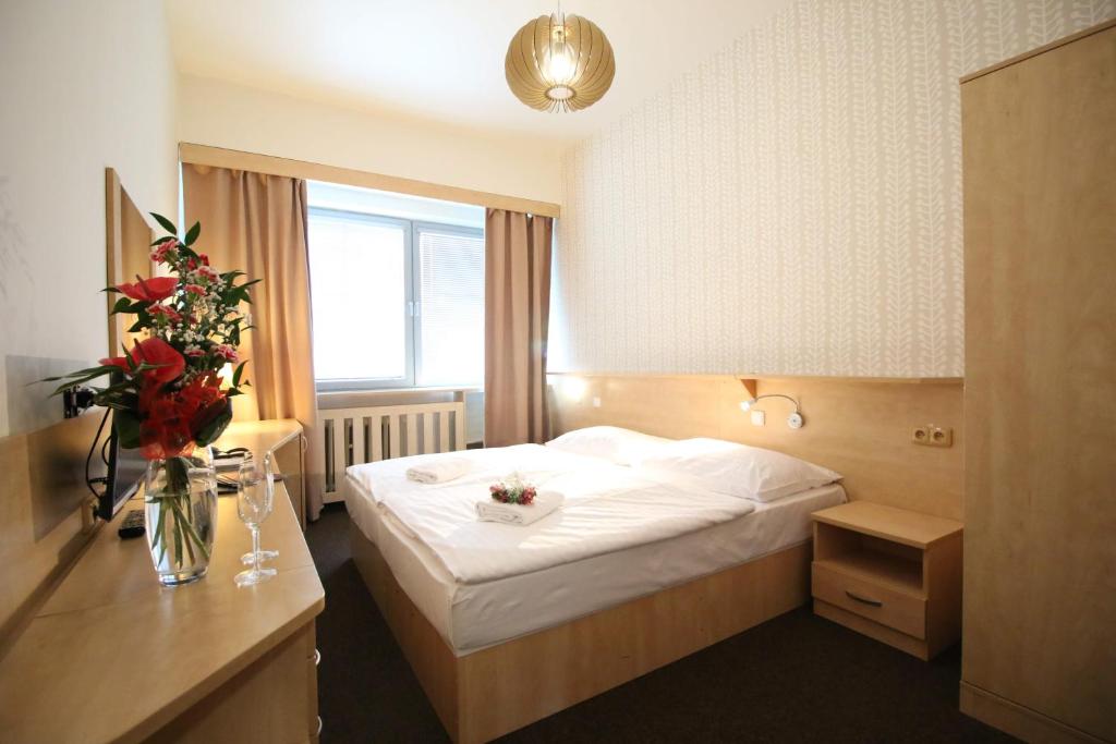 Postel nebo postele na pokoji v ubytování Abitohotel