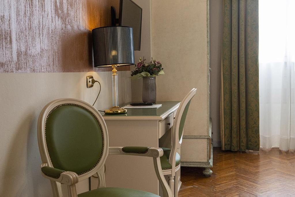 TV a/nebo společenská místnost v ubytování Hotel Donatello
