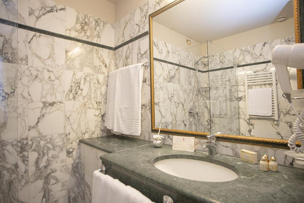 Koupelna v ubytování Hotel Donatello