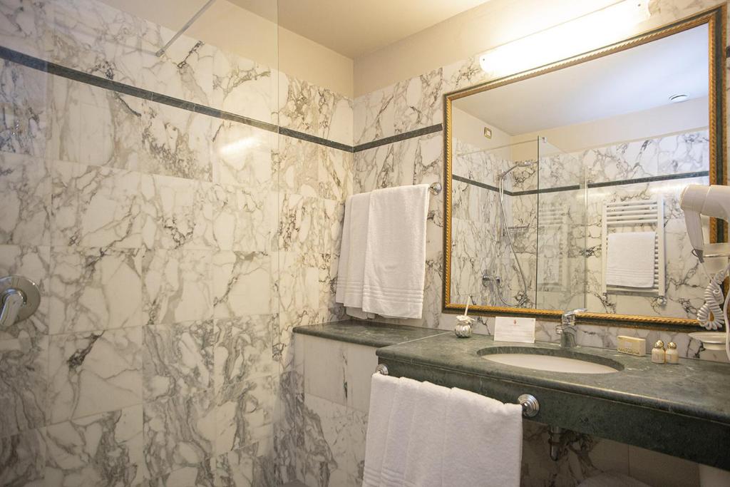 Koupelna v ubytování Hotel Donatello