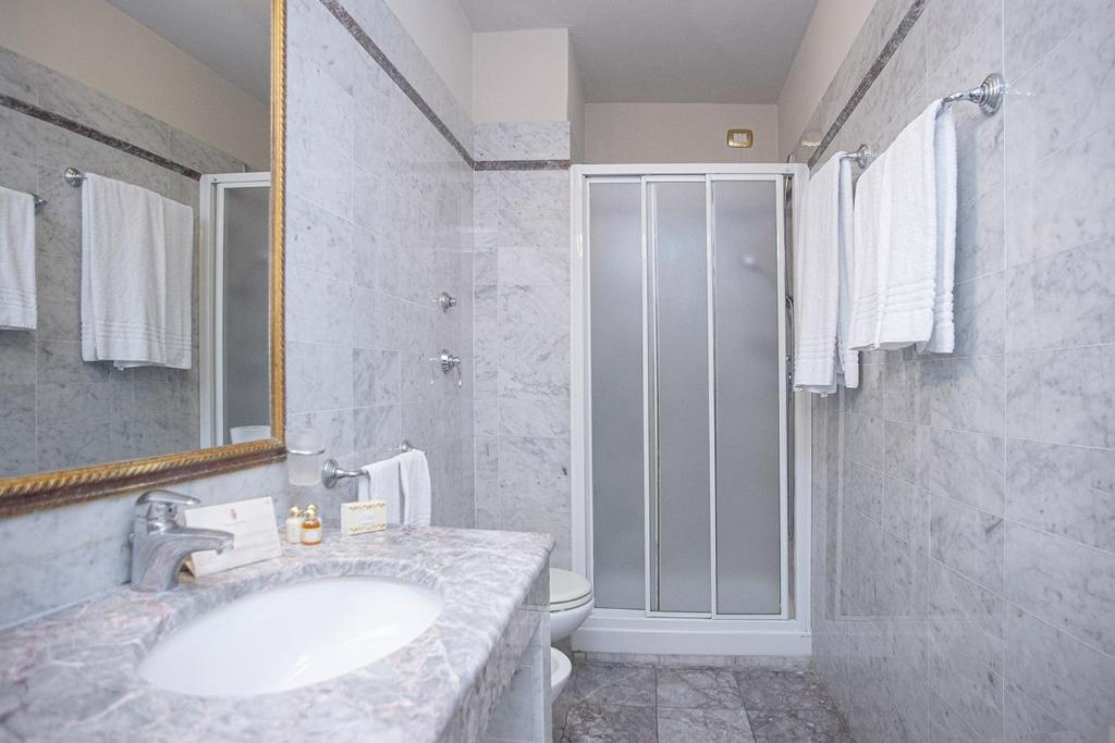Koupelna v ubytování Hotel Donatello