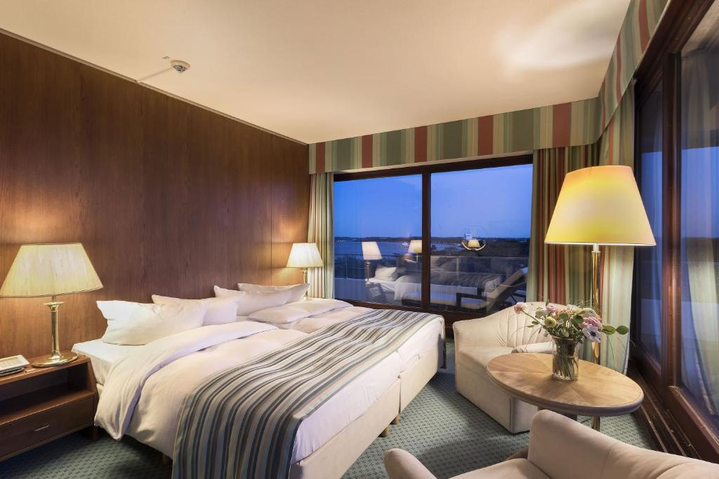 Postel nebo postele na pokoji v ubytování Maritim Seehotel Timmendorfer Strand