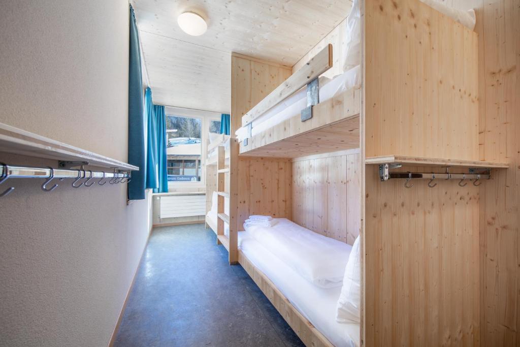 Gadmer Lodge - dein Zuhause in den Bergen客房内的一张或多张床位