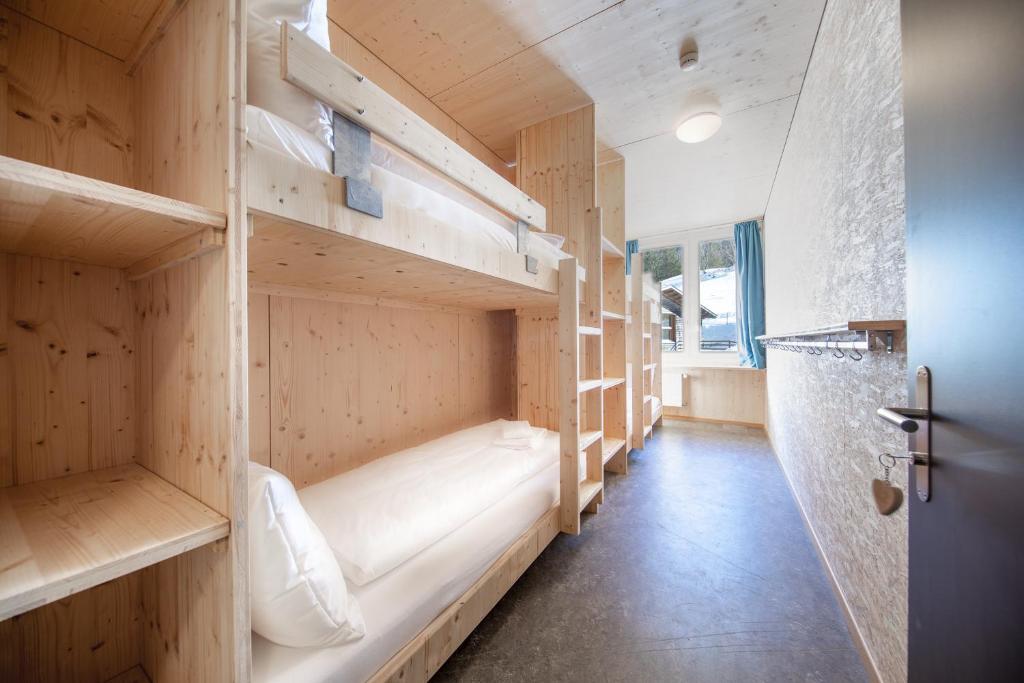Gadmer Lodge - dein Zuhause in den Bergen客房内的一张或多张床位