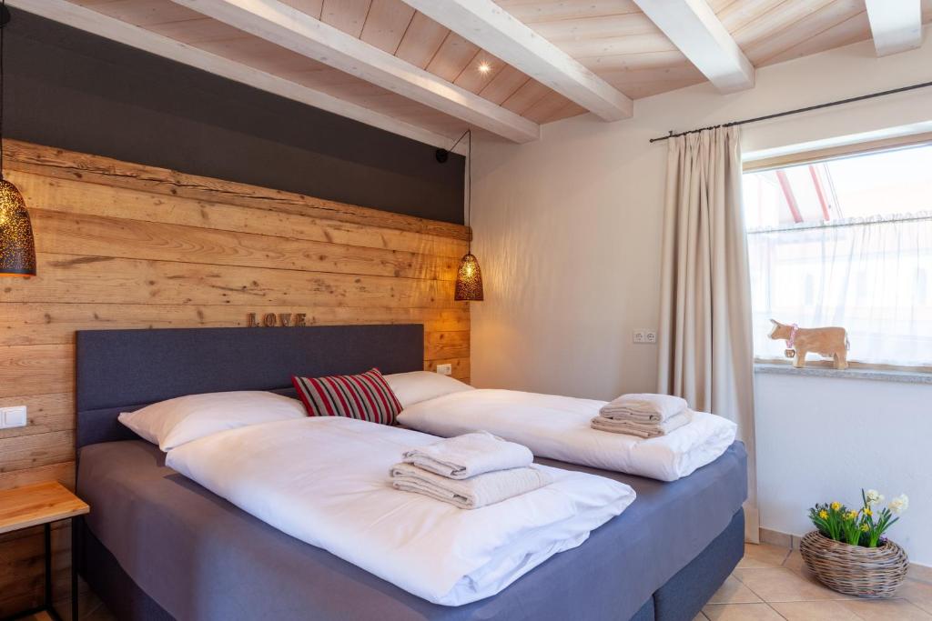 Postel nebo postele na pokoji v ubytování Hotel Natur-Landhaus Krone