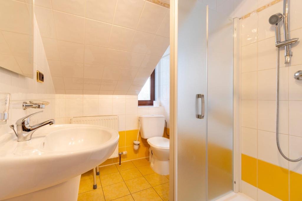 Koupelna v ubytování Hotel Karl