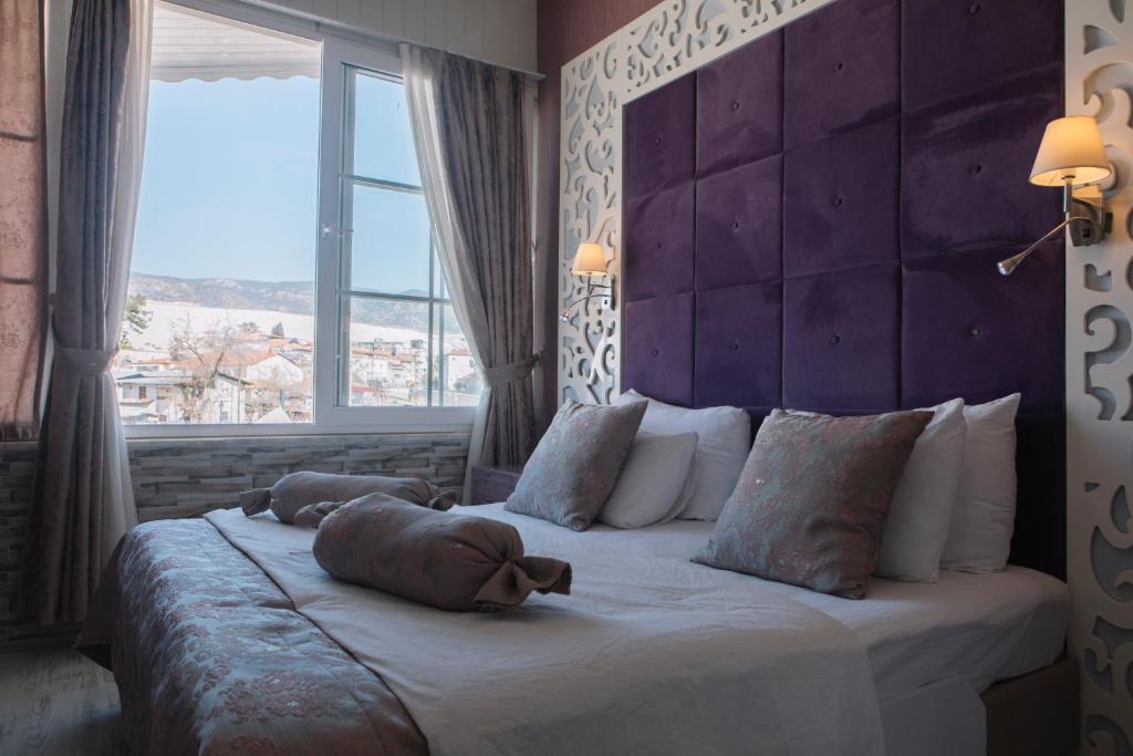 Postel nebo postele na pokoji v ubytování Melrose Viewpoint Pamukkale