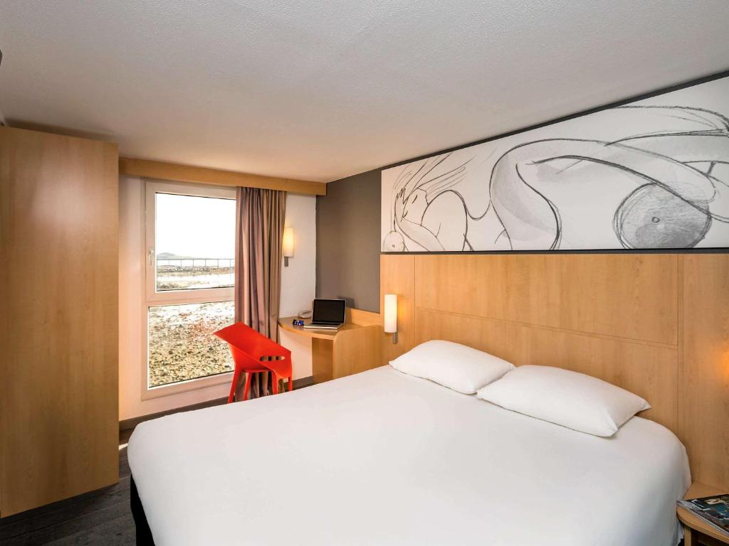 Postel nebo postele na pokoji v ubytování Ibis Roscoff