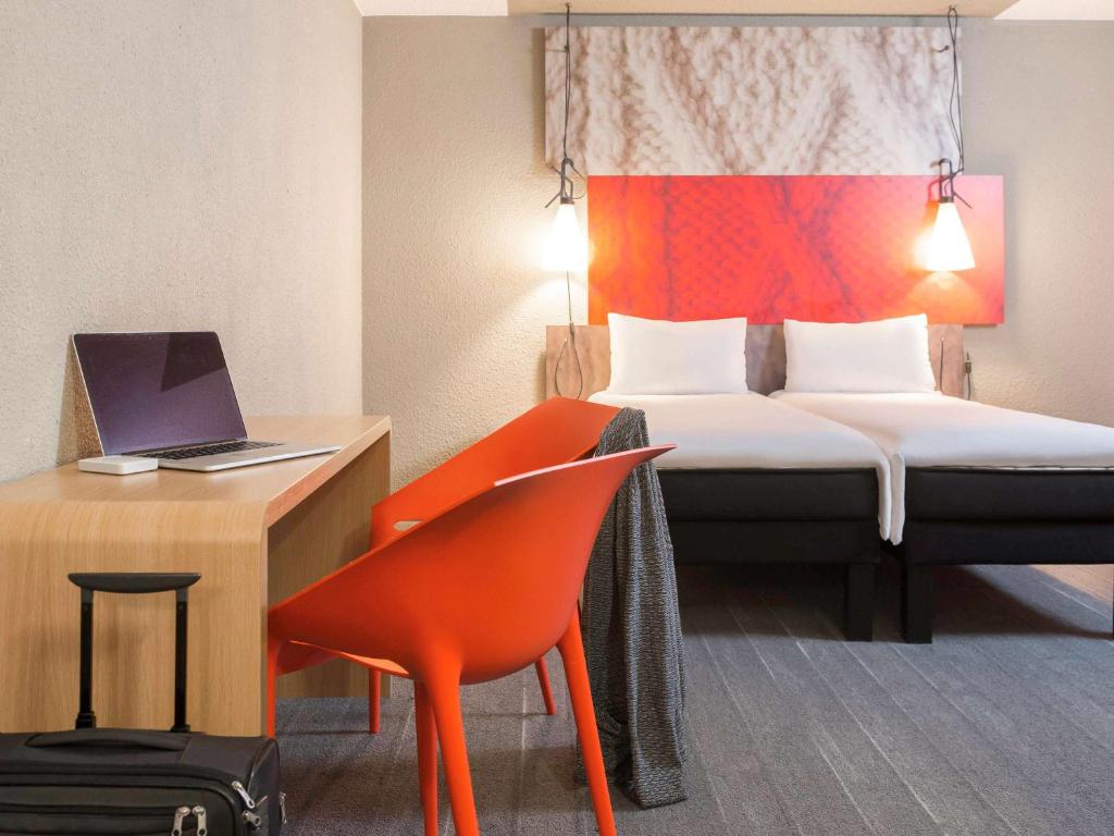 Postel nebo postele na pokoji v ubytování ibis Liège Centre Opéra