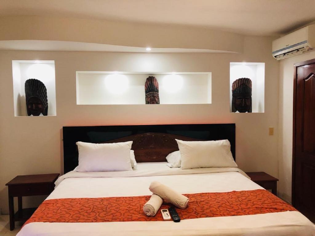 Postel nebo postele na pokoji v ubytování Hotel Yurupary AMAZONAS