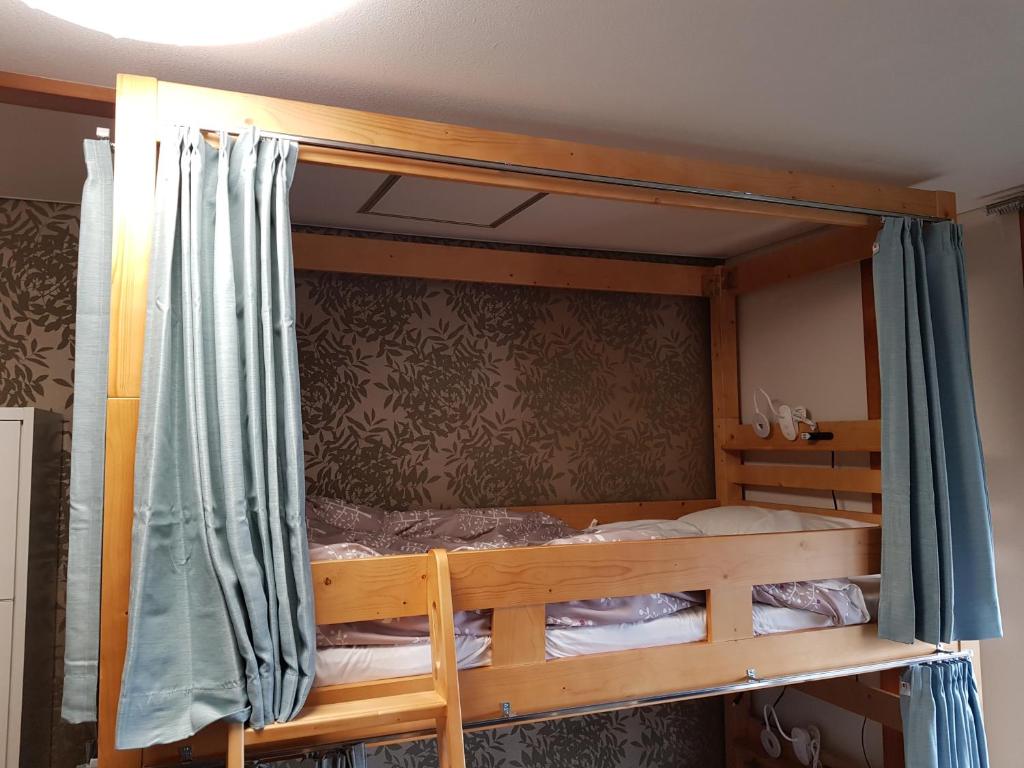 Postel nebo postele na pokoji v ubytování Guesthouse Zink