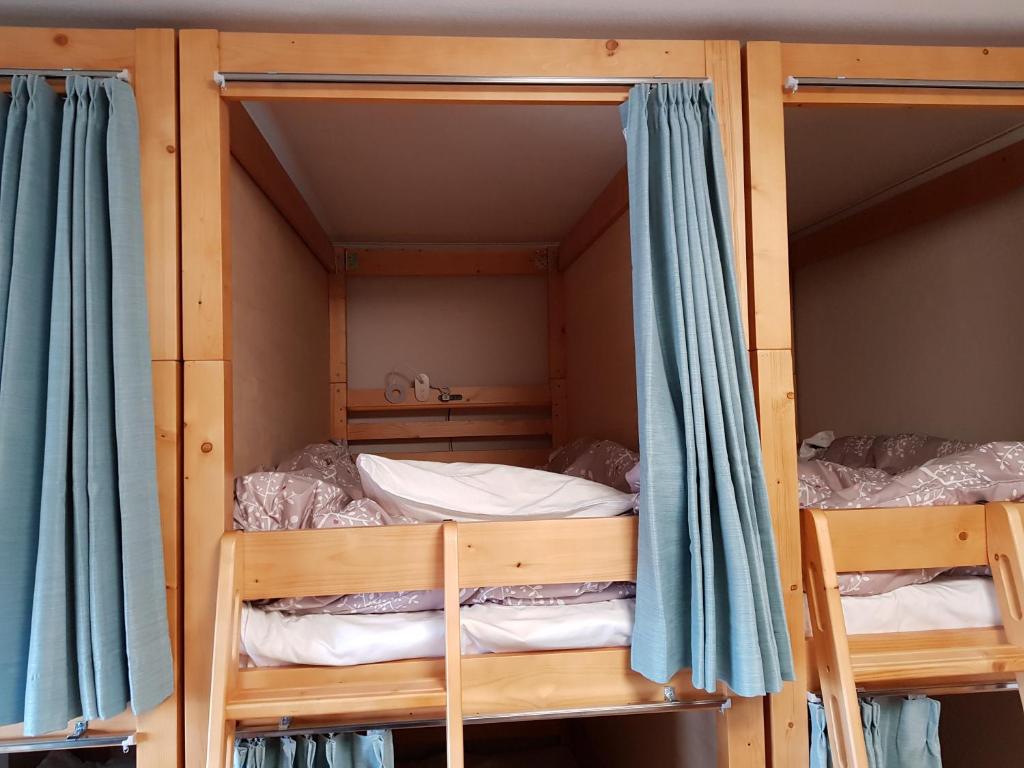 Postel nebo postele na pokoji v ubytování Guesthouse Zink
