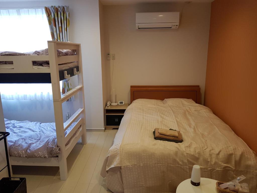 Postel nebo postele na pokoji v ubytování Guesthouse Zink