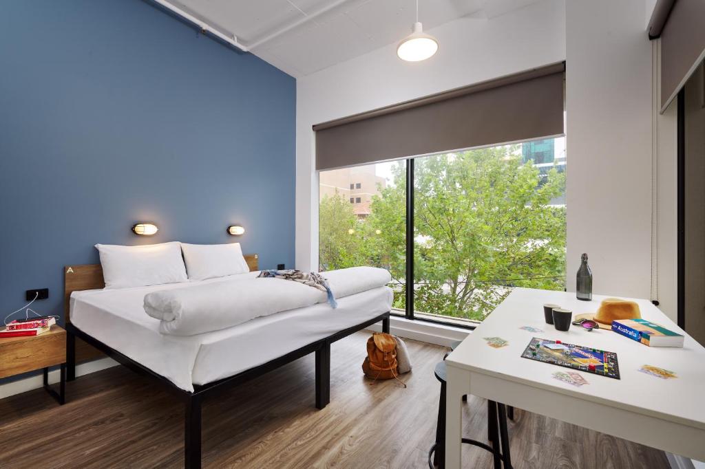 Postel nebo postele na pokoji v ubytování Hostel G Perth