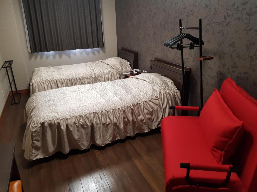 Postel nebo postele na pokoji v ubytování Guesthouse Zink