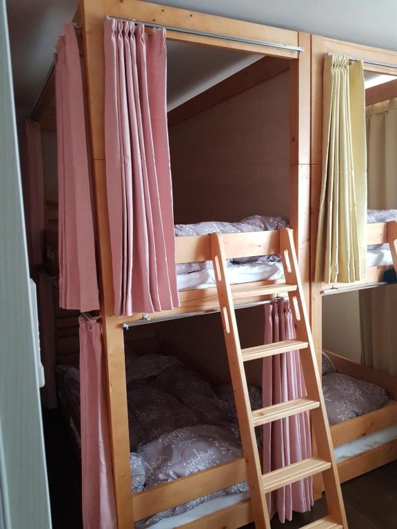 Postel nebo postele na pokoji v ubytování Guesthouse Zink