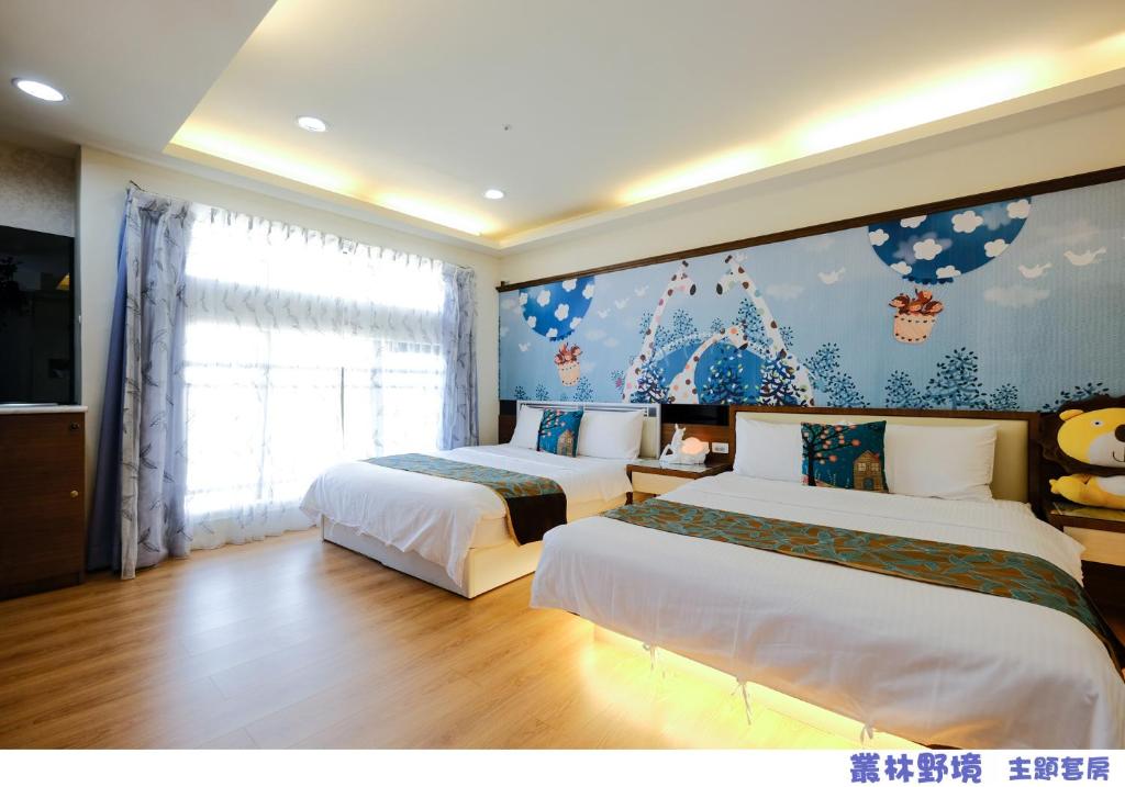 Postel nebo postele na pokoji v ubytování 85 Asia Hotel