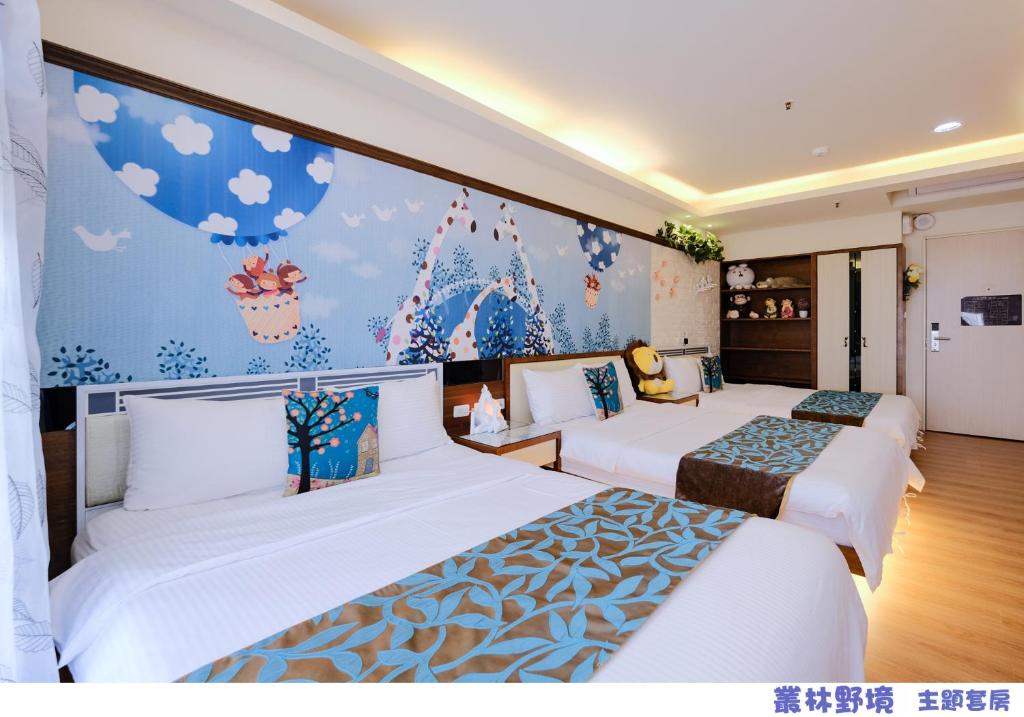 Postel nebo postele na pokoji v ubytování 85 Asia Hotel
