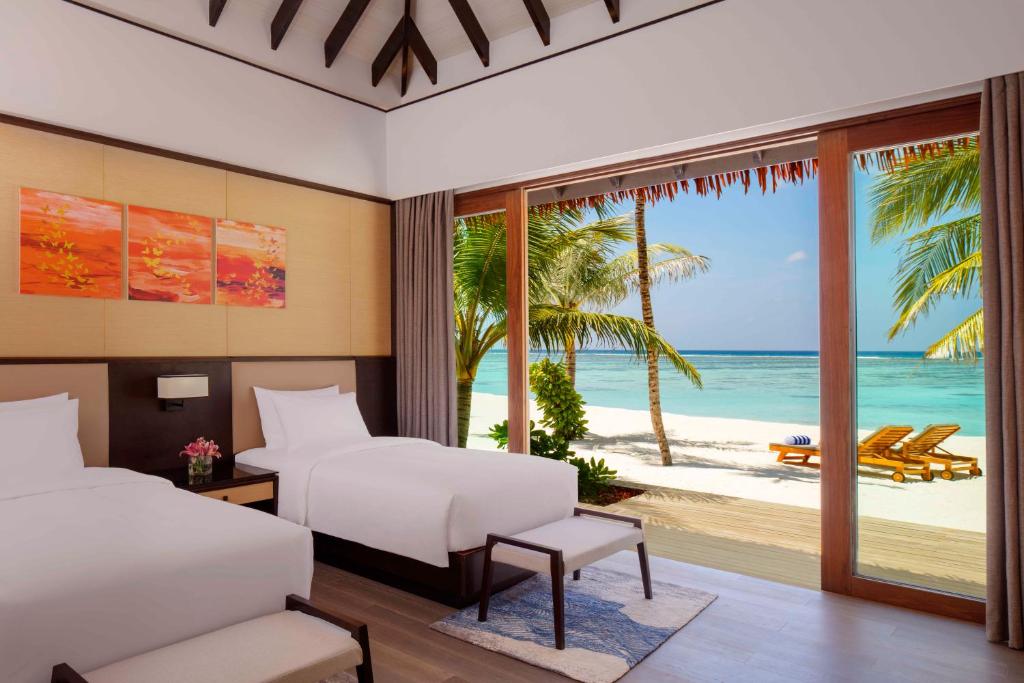Radisson Blu Resort Maldives with 50 percent off on Sea Plane round trip 03 nights & above photo