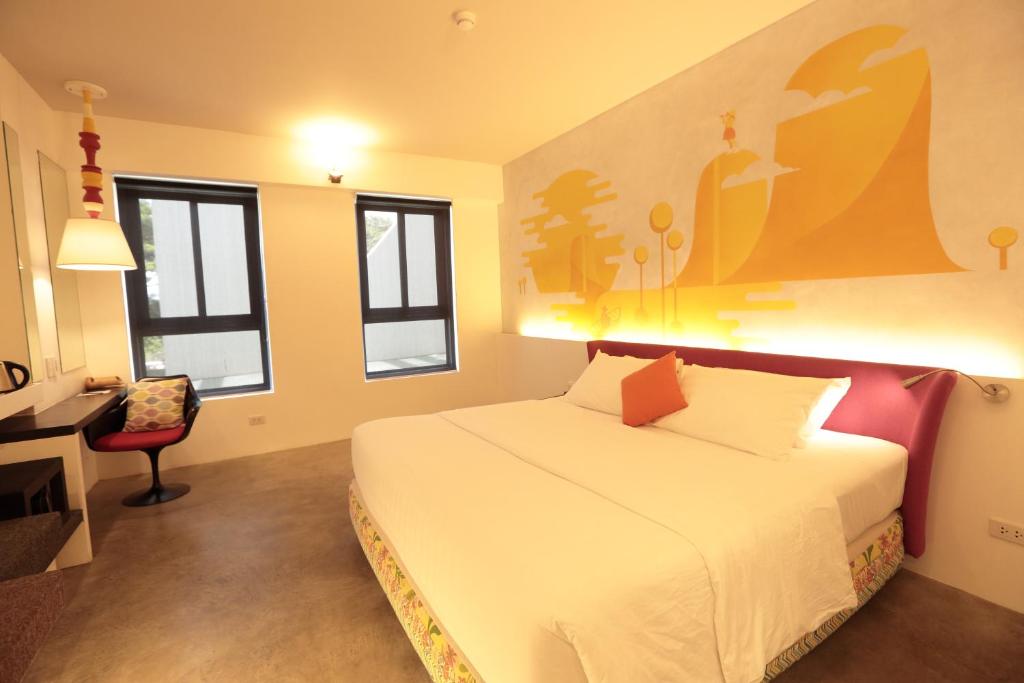 Postel nebo postele na pokoji v ubytování Canvas Boutique Hotel