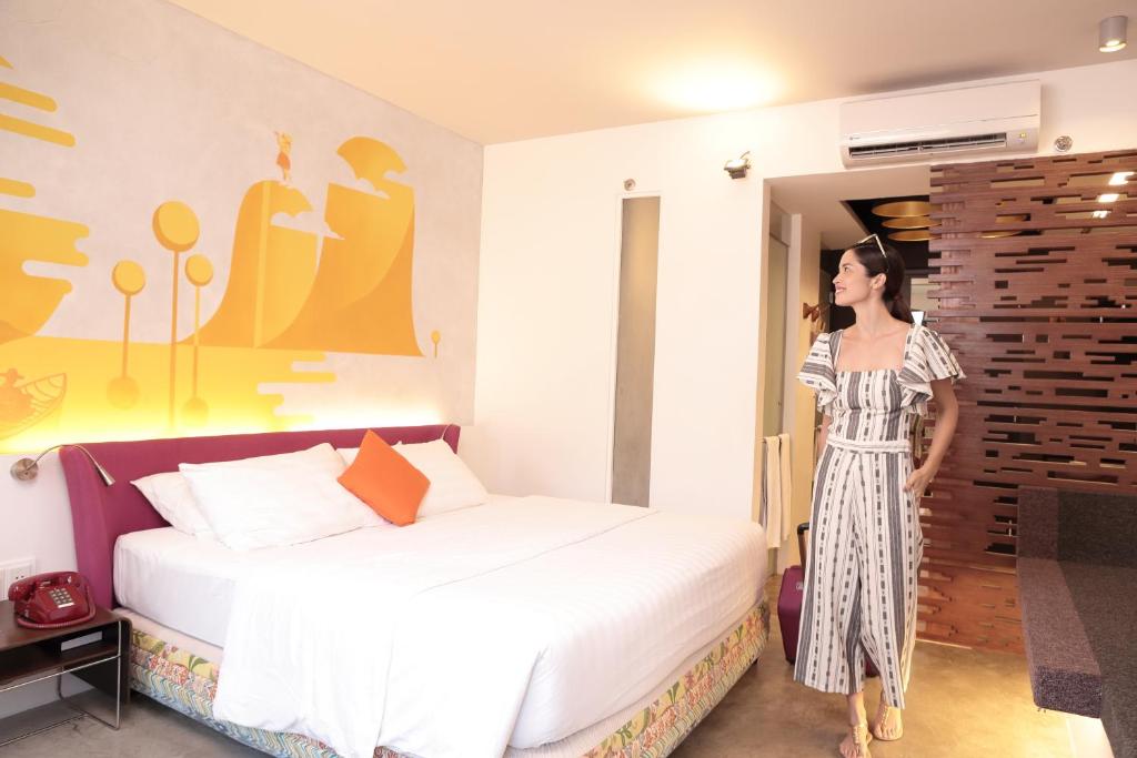 Postel nebo postele na pokoji v ubytování Canvas Boutique Hotel