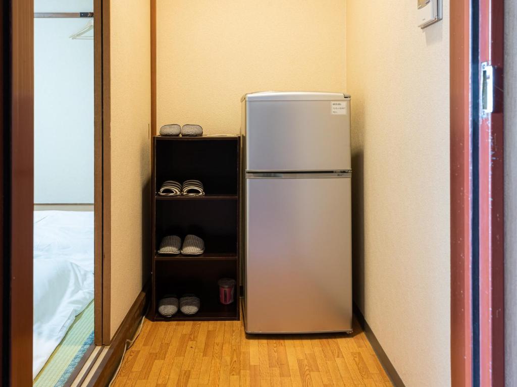 Kuchyň nebo kuchyňský kout v ubytování Tabist Hotel Kurama Hikone
