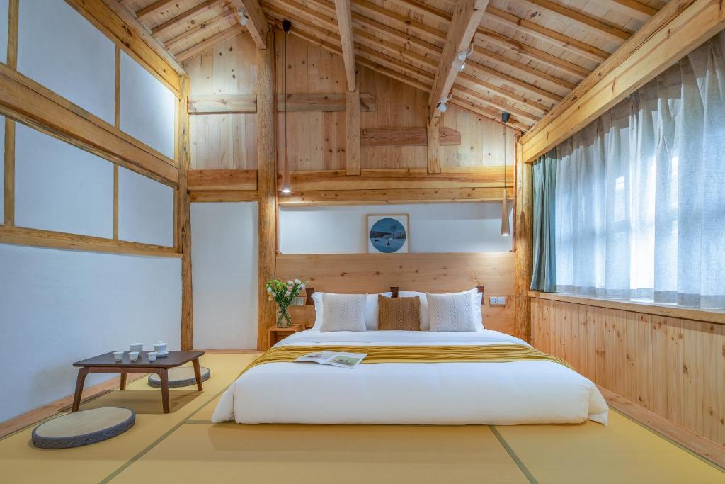 Postel nebo postele na pokoji v ubytování SuShe Inn（2nd Jianshe Inn)