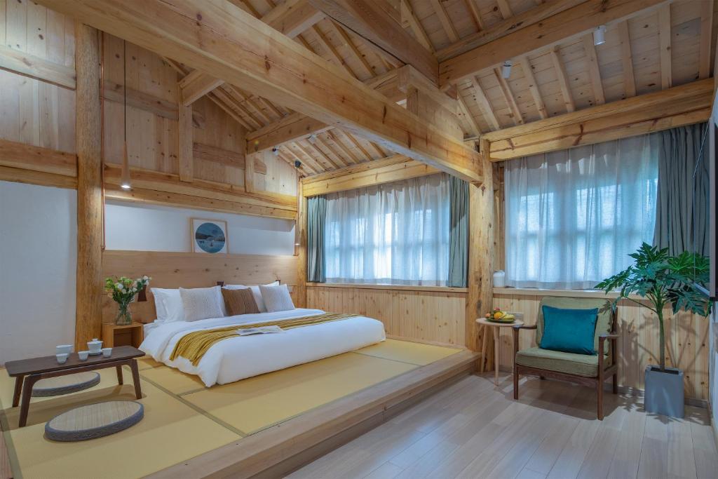 Postel nebo postele na pokoji v ubytování SuShe Inn（2nd Jianshe Inn)