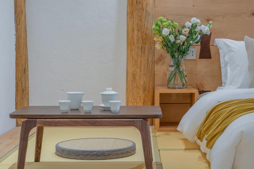 Postel nebo postele na pokoji v ubytování SuShe Inn（2nd Jianshe Inn)