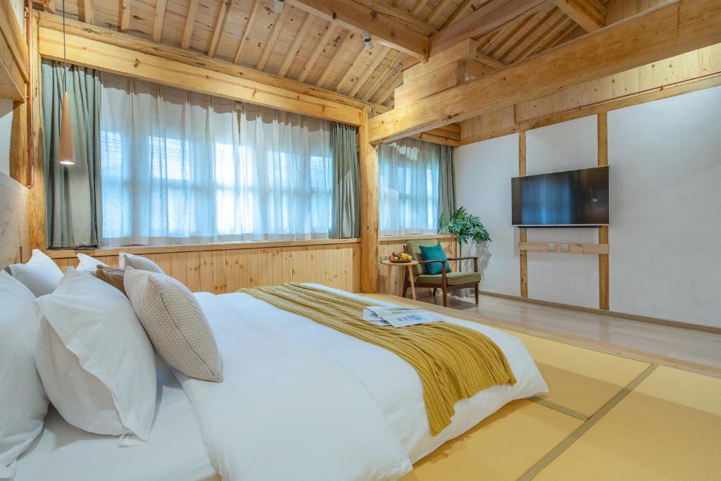 TV a/nebo společenská místnost v ubytování SuShe Inn（2nd Jianshe Inn)