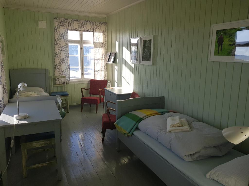 Postel nebo postele na pokoji v ubytování Granum Gård