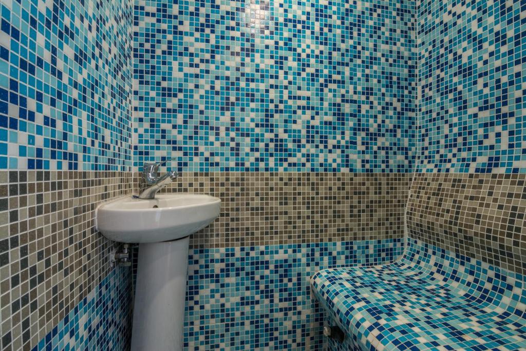 Koupelna v ubytování Grami Hotel